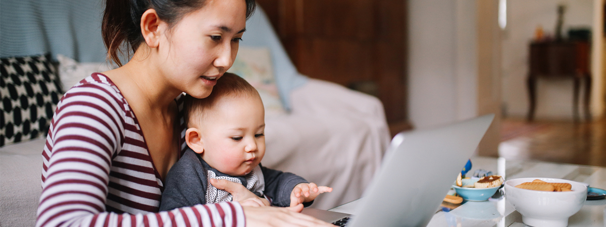 Mom calling CAA Assistance with young child