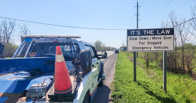CAA Tow Truck Next to Move Over Sign (2)