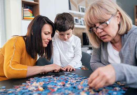 Family playing with puzzles