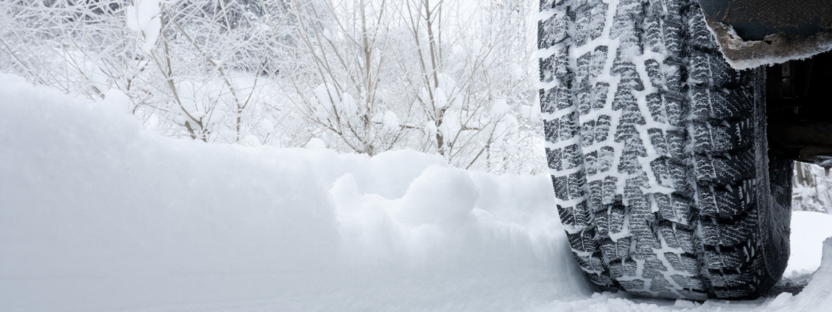 Winter Tire on snow covered road.