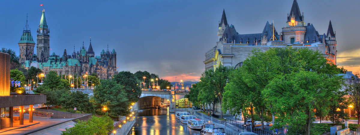 The Rideau Canal at sunset with the Canadian Parliament building in the background.jpg