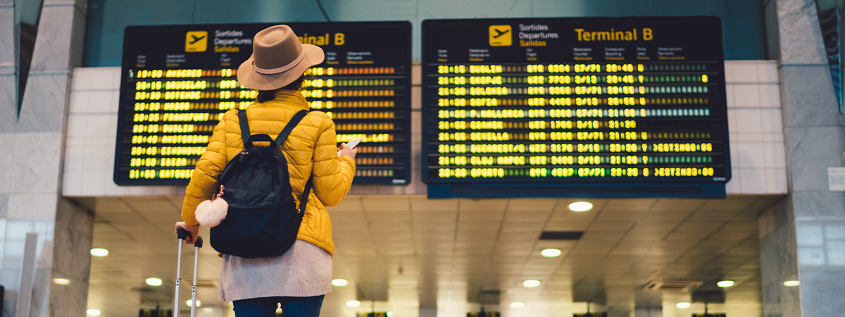 Tourist looking at flight updates