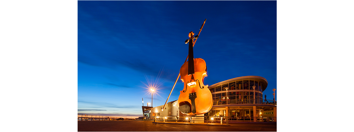 Worlds Largest Fiddle at night, located in Sydney, Nova Scotia