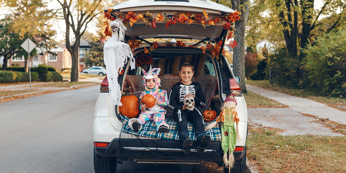 Kids dressed in Halloween costumes and ready to go trick-or-treating