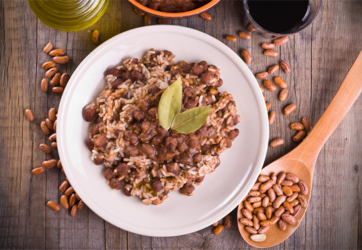 Rice and beans topped with a bay leaf