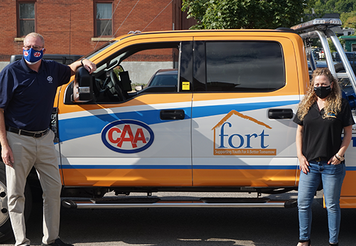 Peter Van Hezewyk, President and CEO of CAA Niagara, and Beth Shaw, Executive Director of Foundation of Resources for Teens, at the official truck unveiling event.