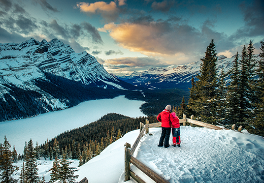 Mother and Daughter enjoying the winter views of Peyto Lake in Banff National park. Canada.